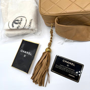 Chanel Vintage CC Tassel Camera Bag | Beige Lambskin | Gold Hardware