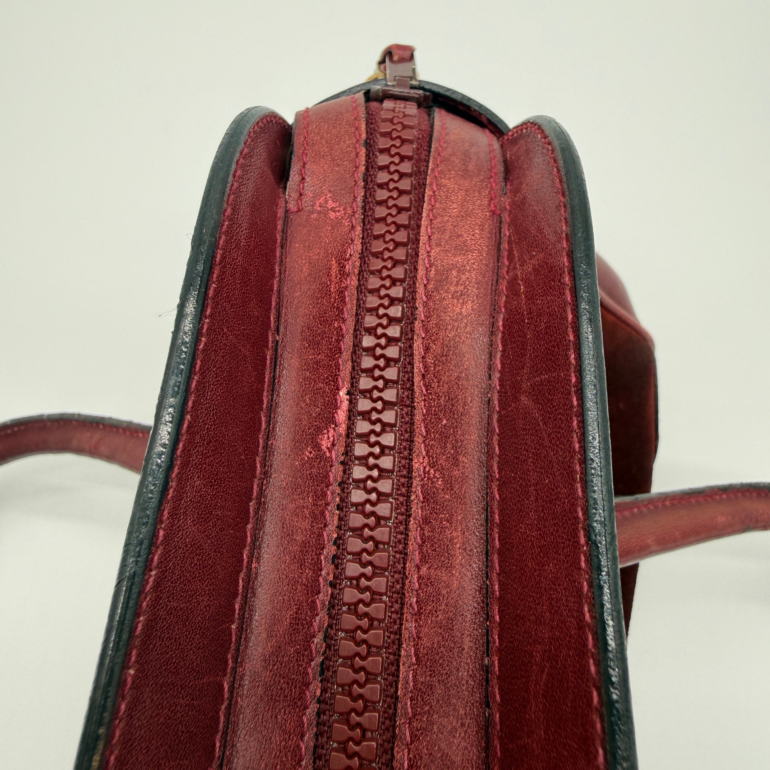 Gucci |  Vintage Burgundy Suede & Leather Top Handle Bag | Gold GG Shield Hardware