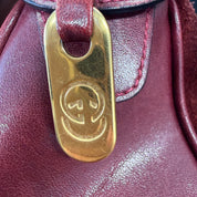 Gucci |  Vintage Burgundy Suede & Leather Top Handle Bag | Gold GG Shield Hardware