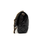 Chanel | Quilted "Around the World" Coin Flap Bag | Black Aged Calfskin | Gold & Silver-Tone Hardware | Series 20 (~25cm)