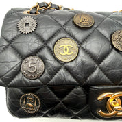 Chanel | Quilted "Around the World" Coin Flap Bag | Black Aged Calfskin | Gold & Silver-Tone Hardware | Series 20 (~25cm)