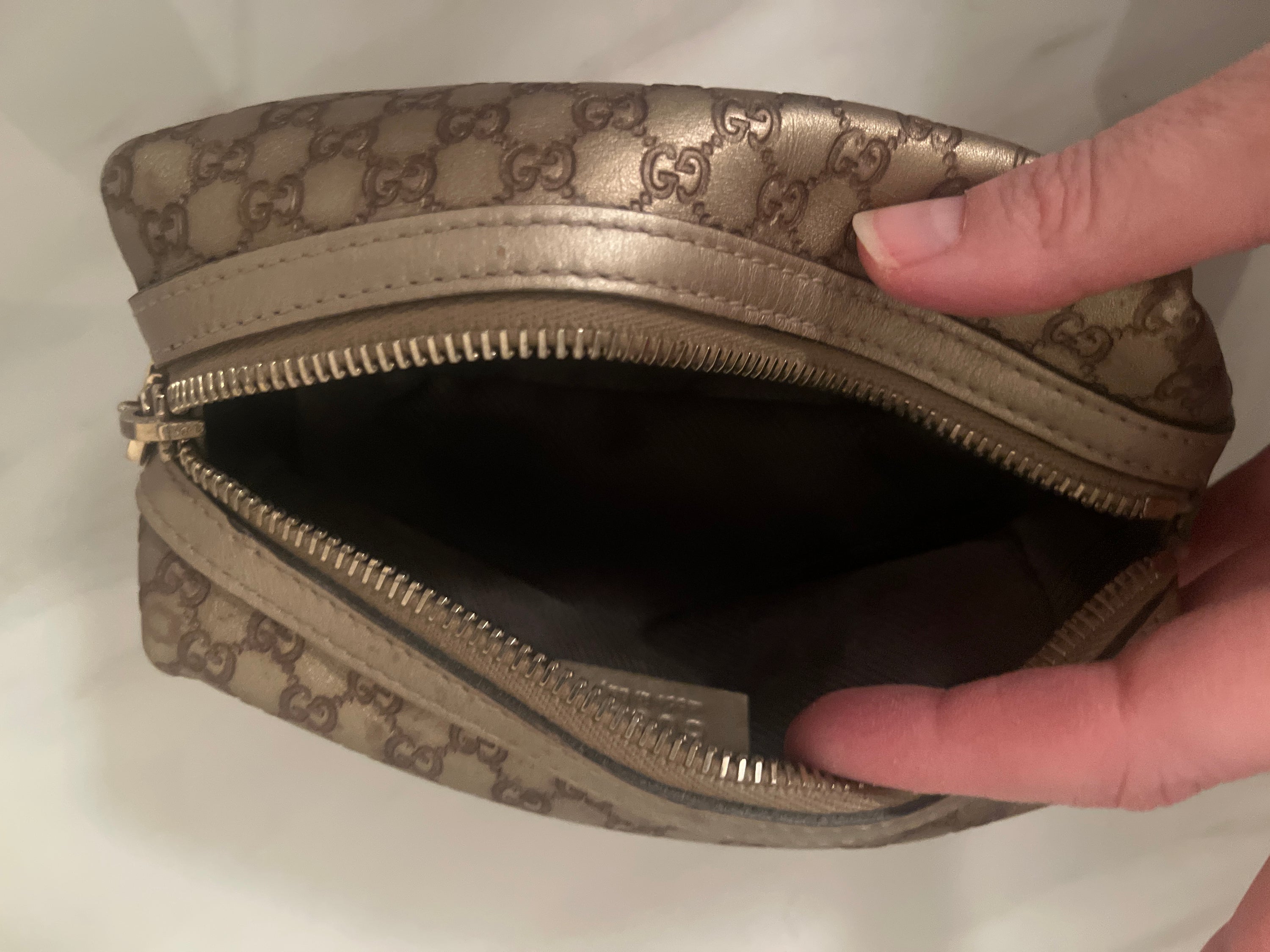 Gucci - cons