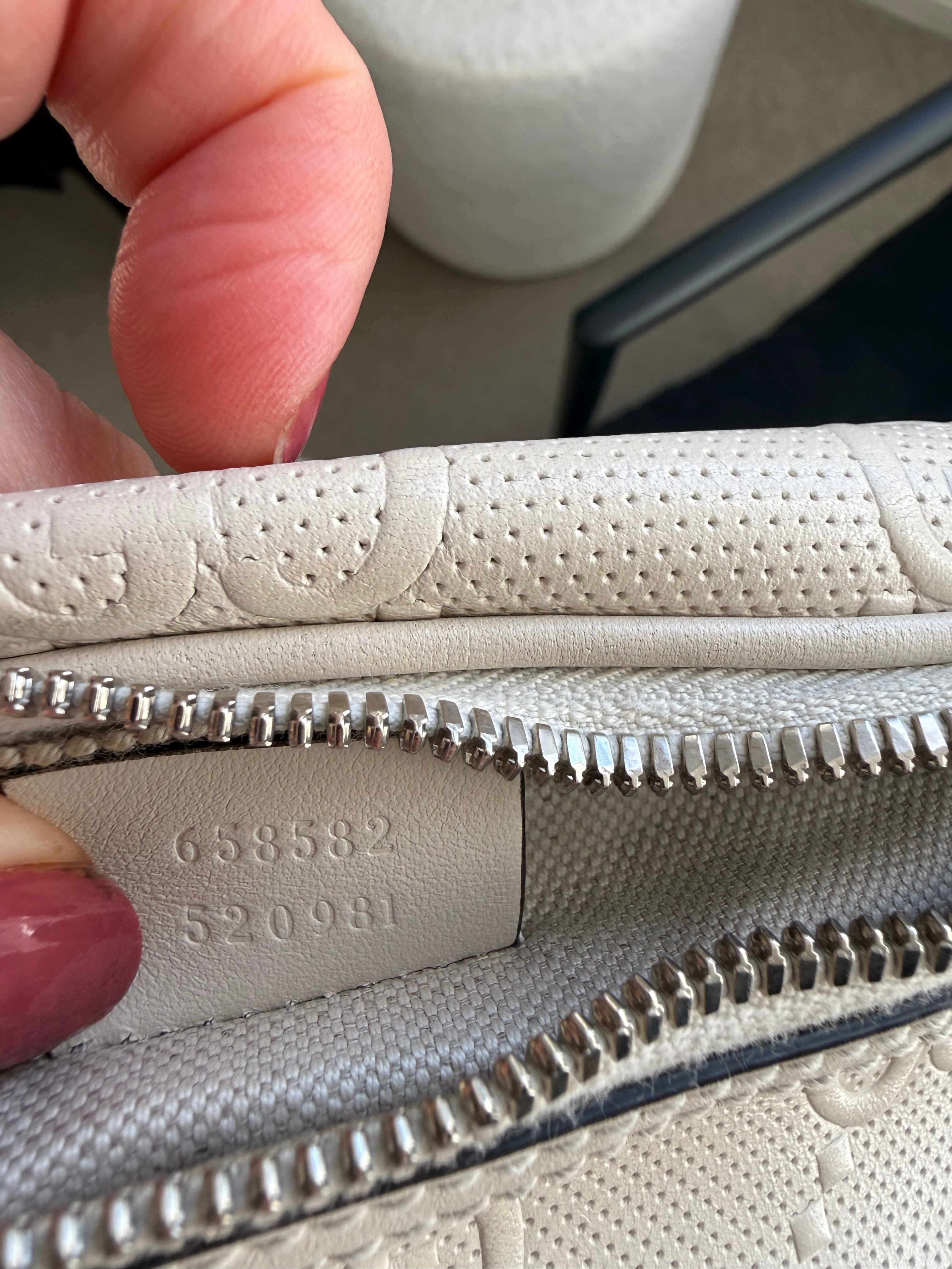 Gucci GG Embossed Belt Bag