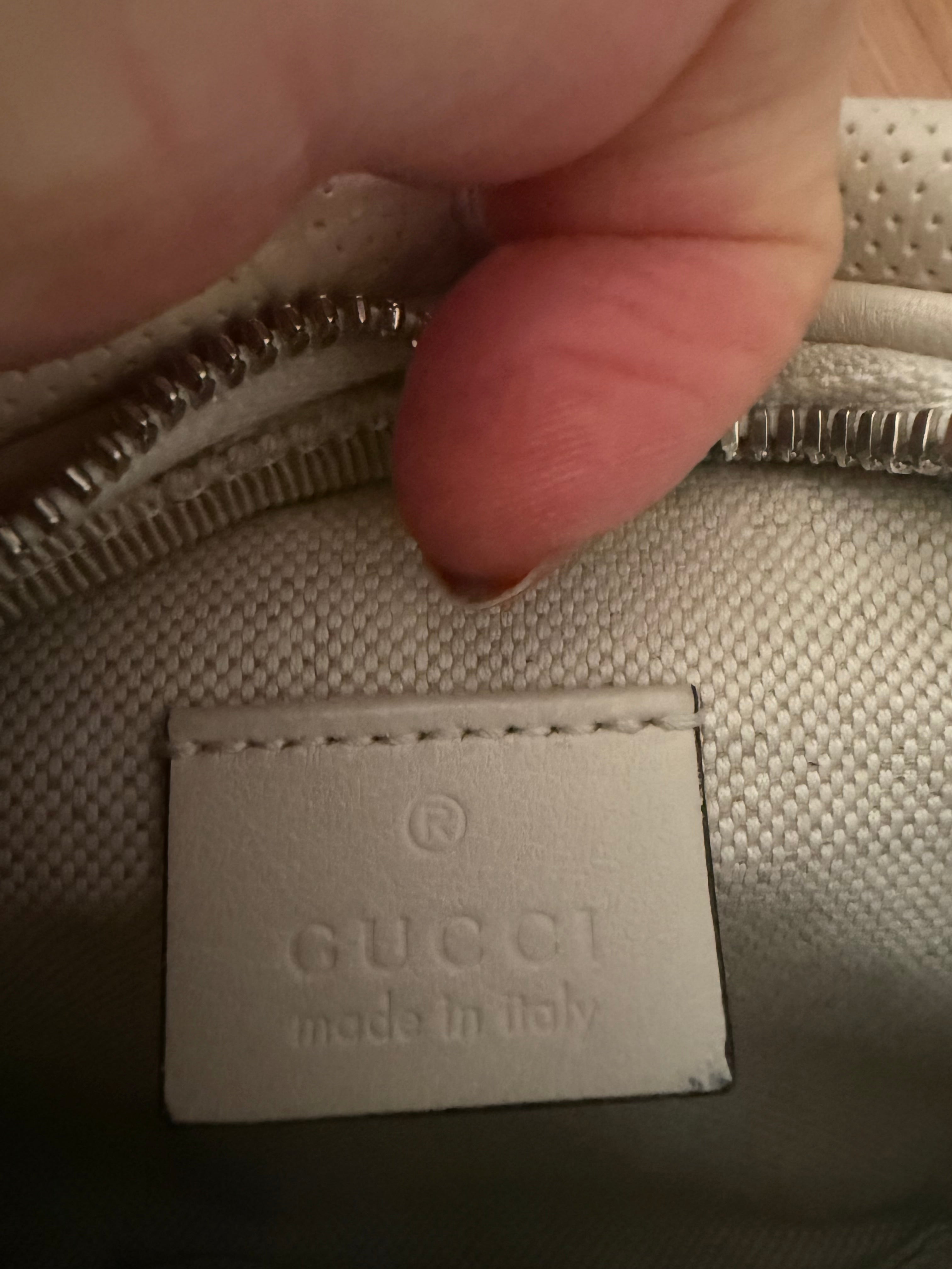 Gucci GG Embossed Belt Bag